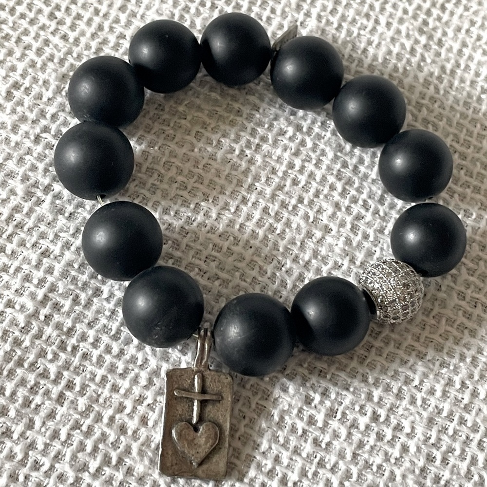 Bracelet black beads and charm